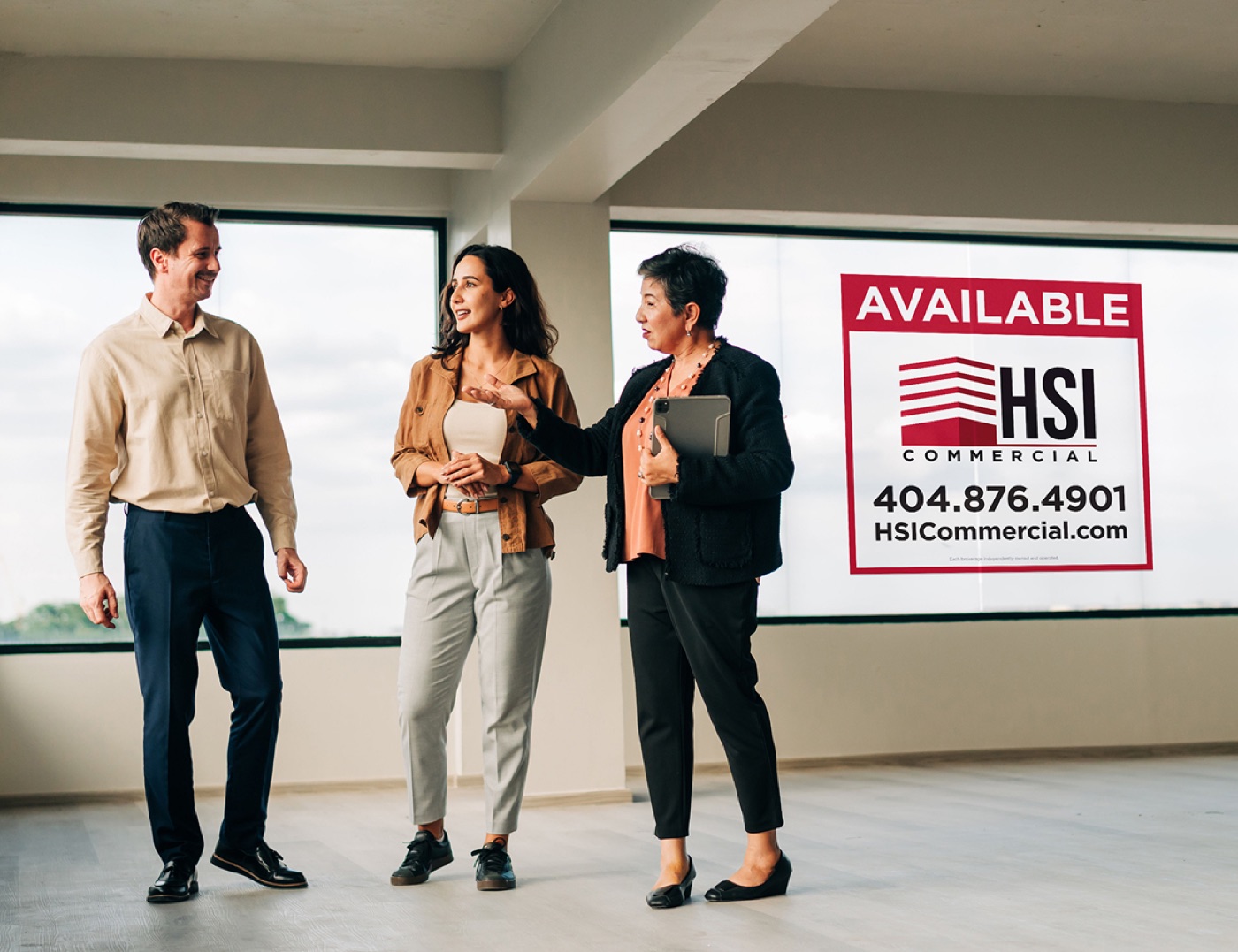 HSI Commercial professionals discussing a property opportunity